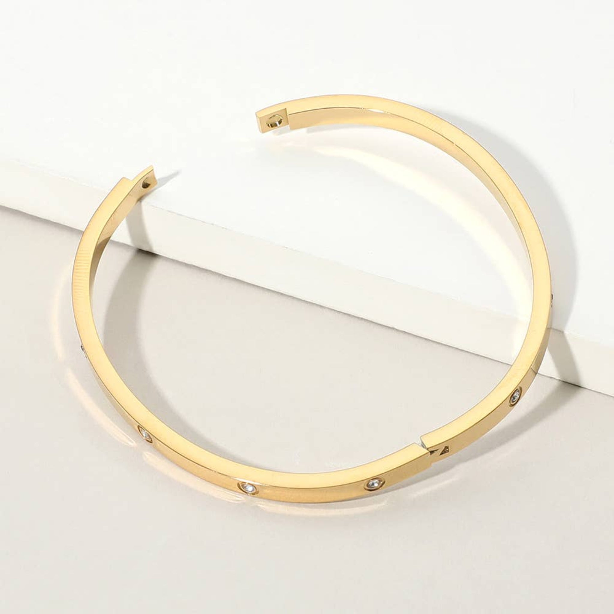 Stainless Steel Stone Paved Hinged Bangle Bracelet | Gold