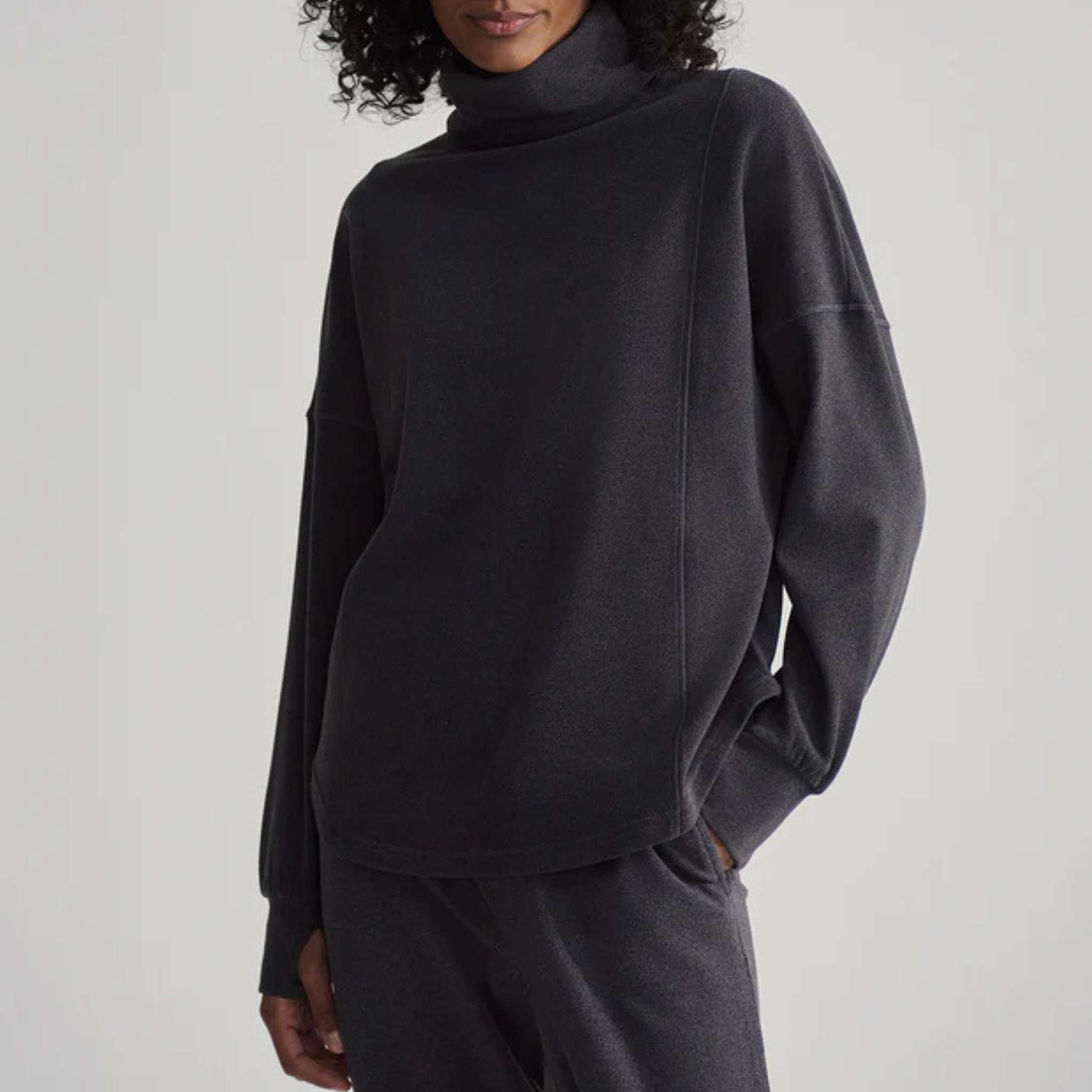 Rainer Roll Neck Jumper | Black Marl