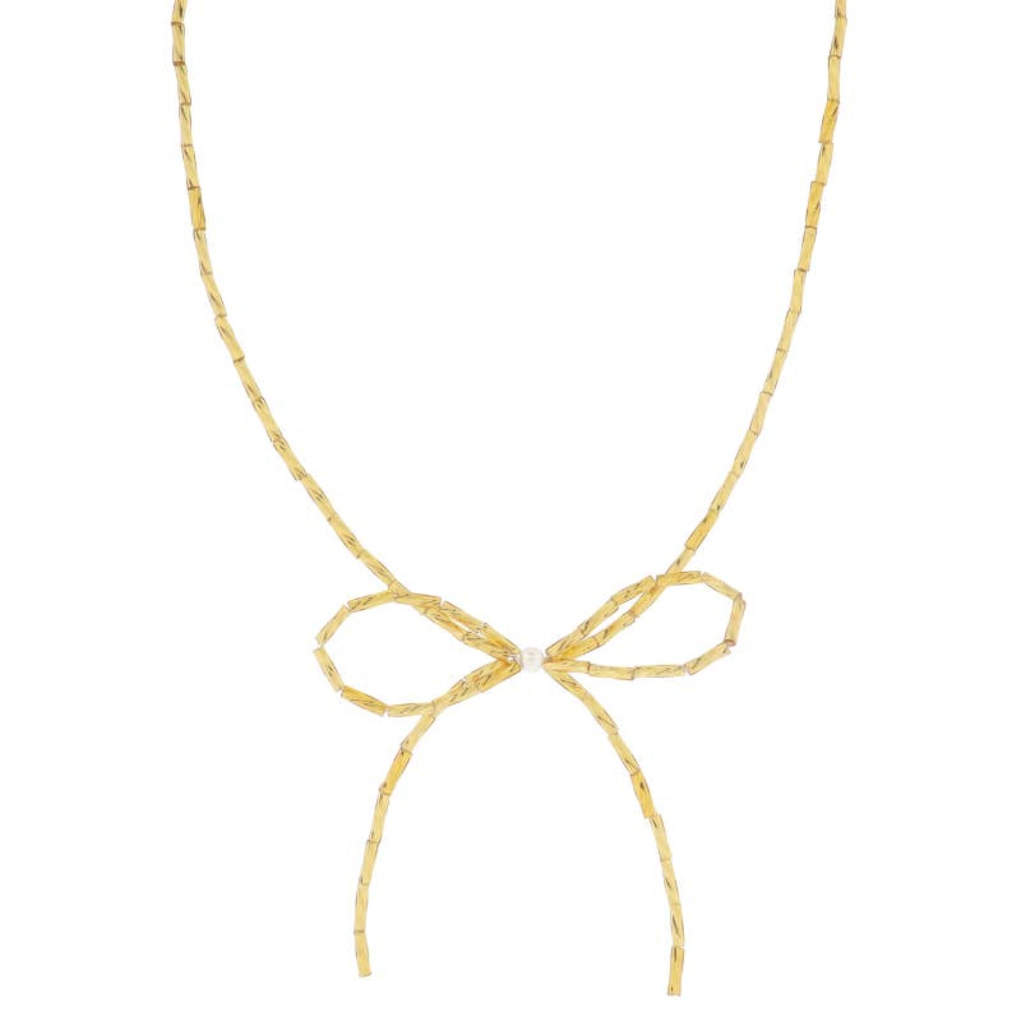 Gold Beaded Strand Necklace with Bow and Pearl Accent