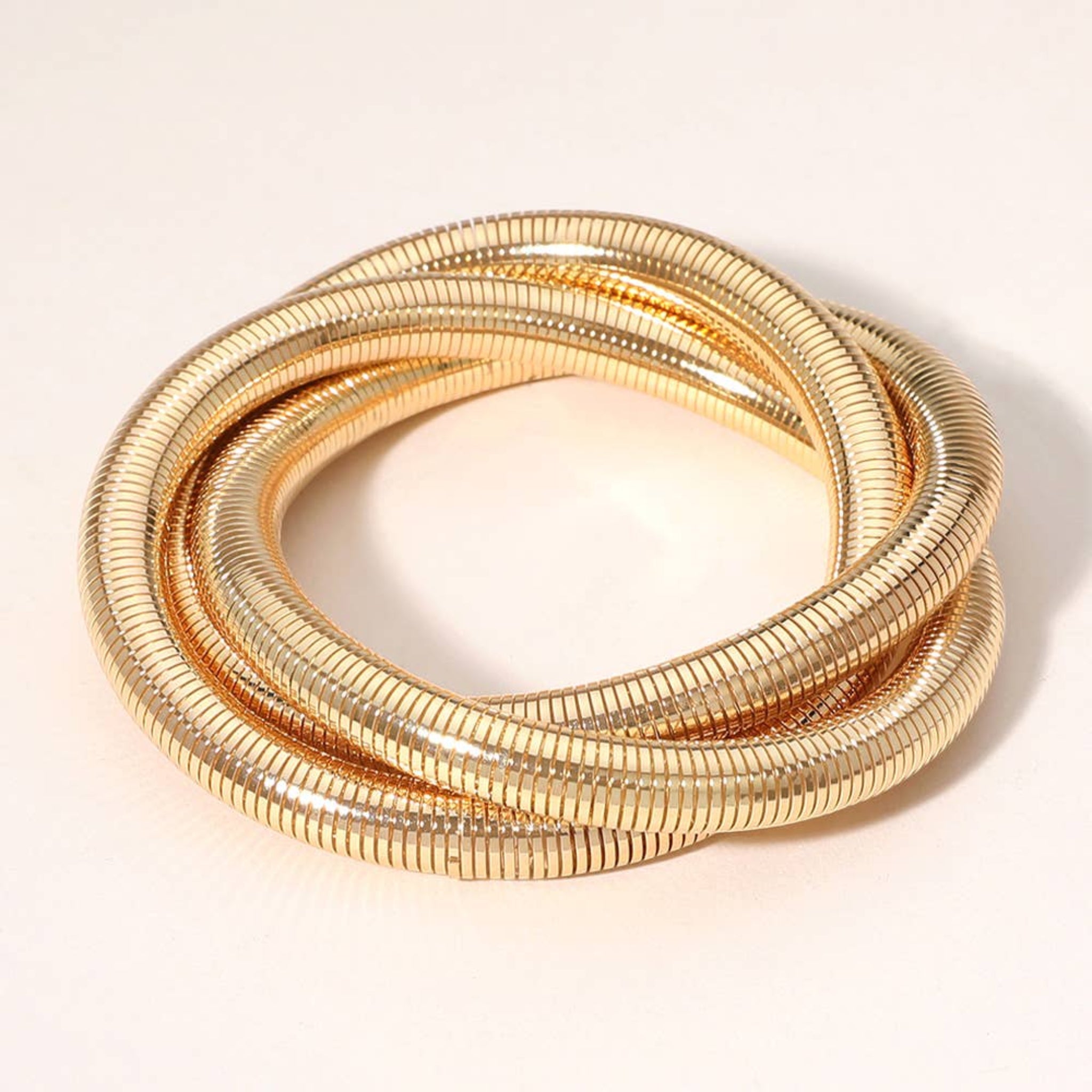 Gold Triple Ribbed Metal Twisted Stretch Bracelet